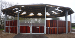 The new riding hall in Newmarket showing the lovely hard wood fence.
